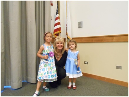 AMA Dance and Music School Director Ann Marie Frank poses with students at the 2015 Spring Music Recital