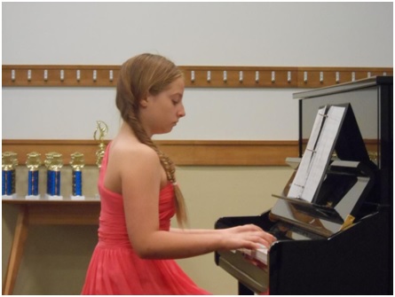 Another talented AMA Dance and Music School student plays the piano at the Spring Recital